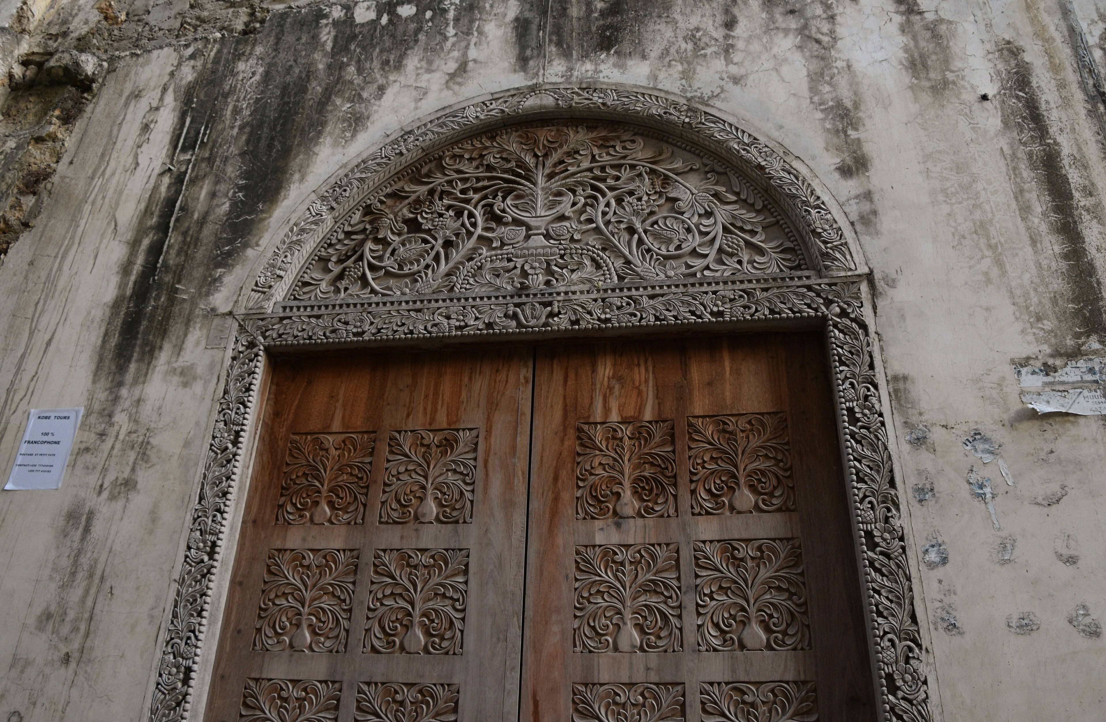 A carved Swahili wooden door in Stone Town, Zanzibar